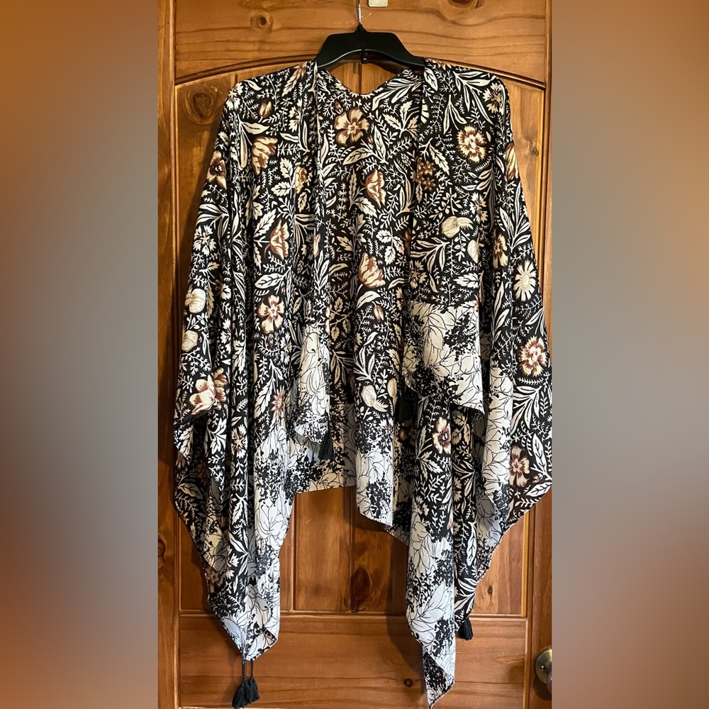 Beautiful, lightweight scarf wrap. One size fits most.